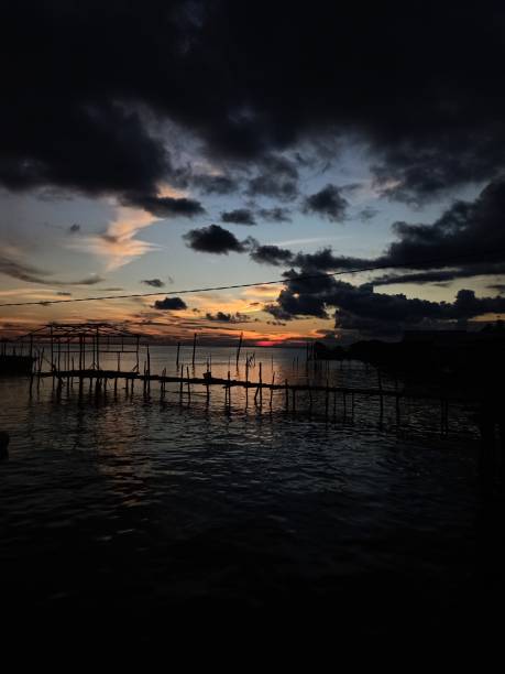 istock Sunset on the beach and ocean 1472118446