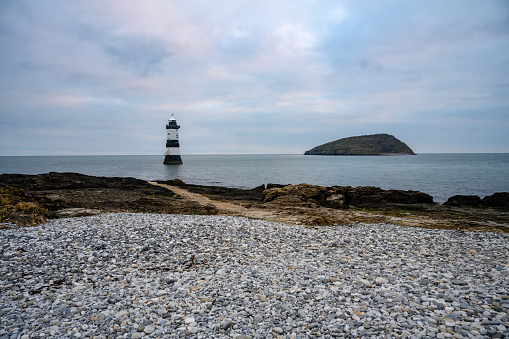 Early morning view of Penman point lighthouse in Wales