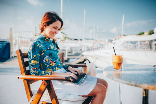 istock Tourist on summer vacation combining work and leisure 1472121992
