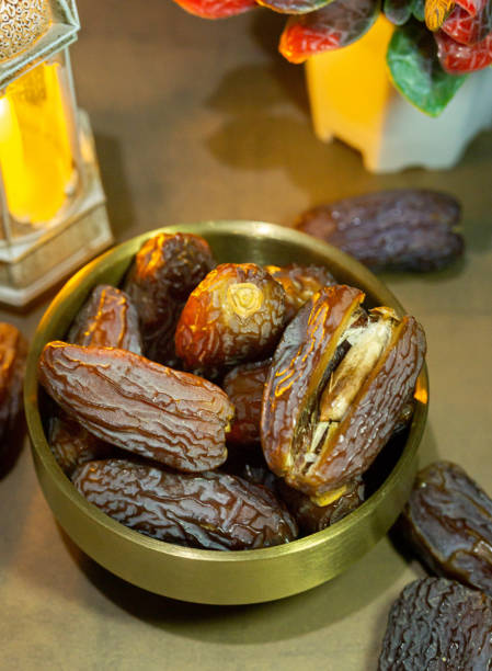 istock Raw Organic Medjool Dates (Kurma in Indonesia). It's also Ramadan Iftar. Ramadan Kareem. Top View. Place for text. 1472123221