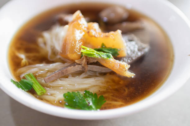 Bowl of beef noodle soup with offal.