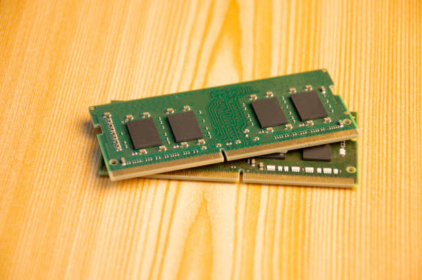 istock top view ddr4 ram laying on wooden floor 1472123658