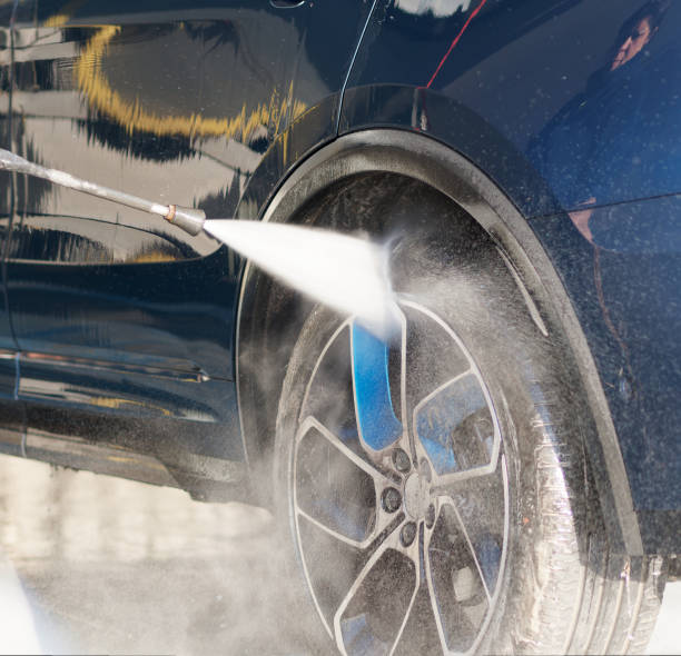 istock washing blue suv at car wash 1472125179
