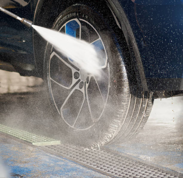 istock washing blue suv at car wash 1472125185