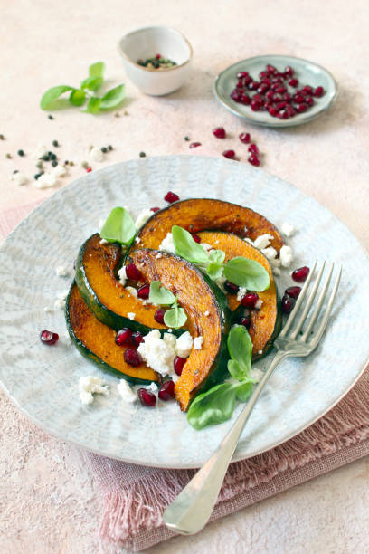 istock Roasted pumpkin served with ricotta cheese and pomegranate. 1472125722