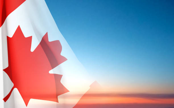 ilustraciones, imágenes clip art, dibujos animados e iconos de stock de bandera nacional de canadá en el cielo del atardecer - canadian flag illustrations