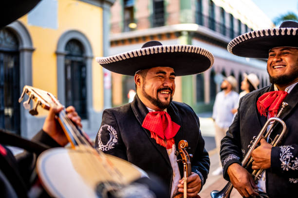 istock Traditional mariachis talking outdoors 1472126696