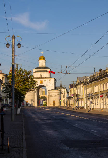 golden gate with a shiny dome in the old town of Vladimir white stone golden gate with a shiny dome in the old town of Vladimir on a sunny summer august day against a blue clear sky golden gate vladimir stock pictures, royalty-free photos & images