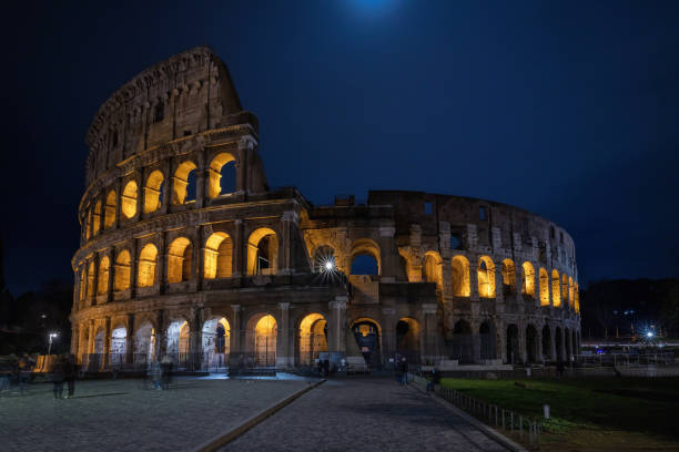 Illuminated Colosseum at night, long exposure.