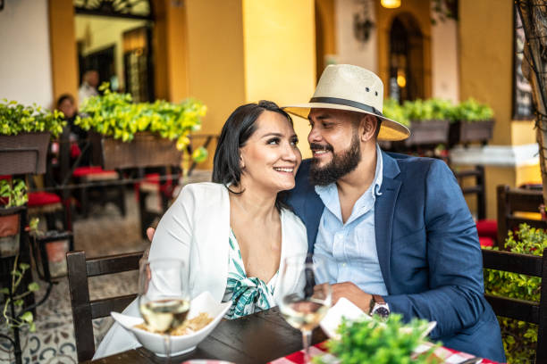 istock Married couple having dinner at a restaurant outdoors 1472134872