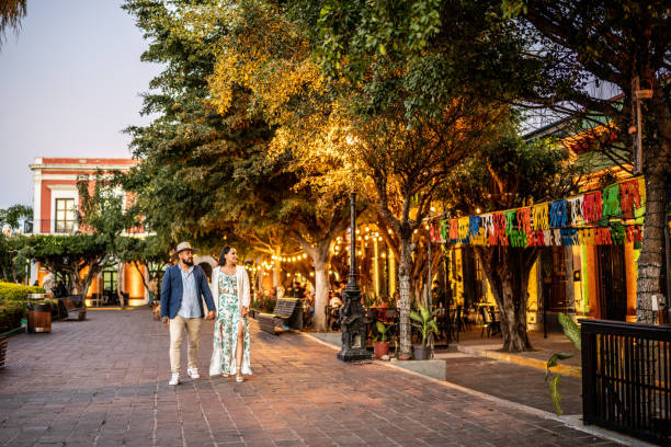Married couple walking along the historic district