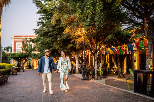 istock Married couple walking along the historic district 1472135278