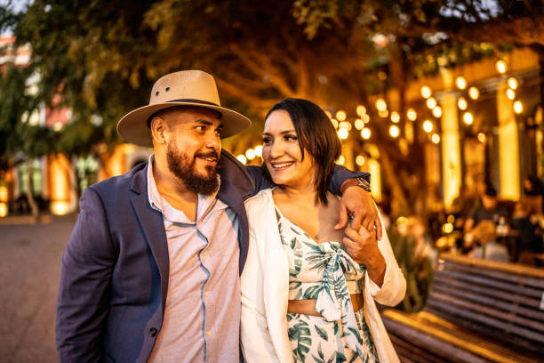 istock Married couple walking along the historic district 1472135339
