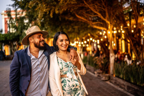 istock Married couple walking along the historic district 1472135341