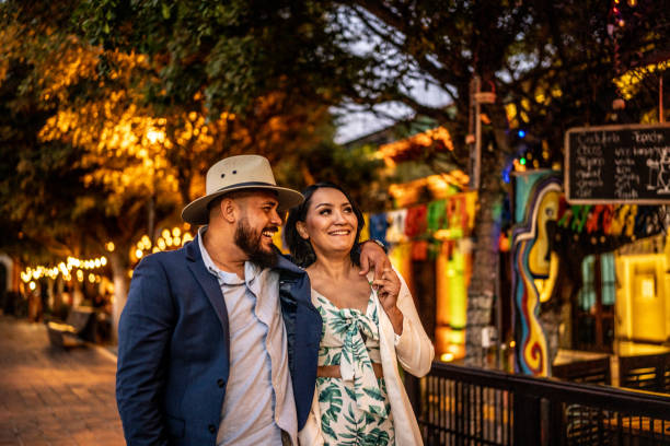 istock Married couple walking along the historic district 1472135378