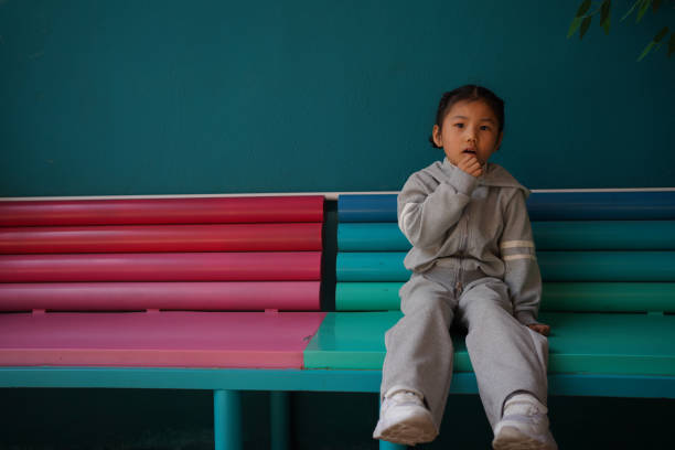 istock Asian little girl has a cold and cough 1472139829