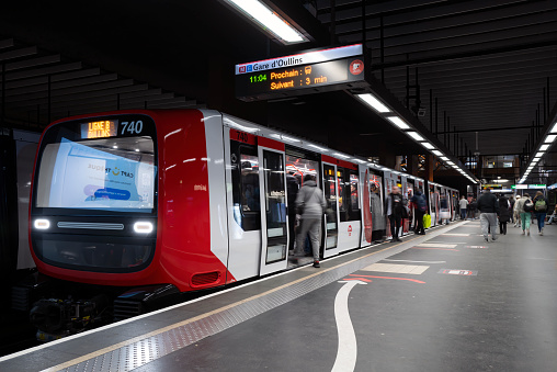 Valencia, Spain - January 14, 2014: Train on airport station in Valencia. Metrovalencia - large suburban network crosses the whole city, consists more than 134 km of track of which 19km is below the ground.