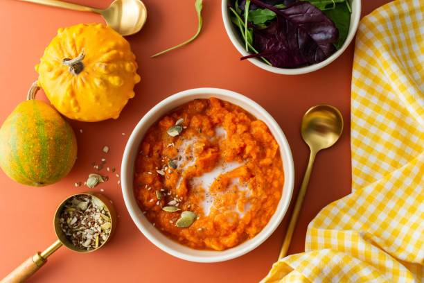 istock Pumpkin soup with seeds and coconut milk 1472147757