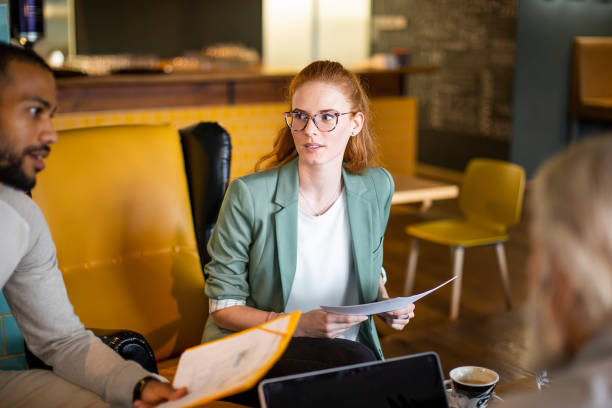 istock Business people having a meeting in a restaurant 1472149643