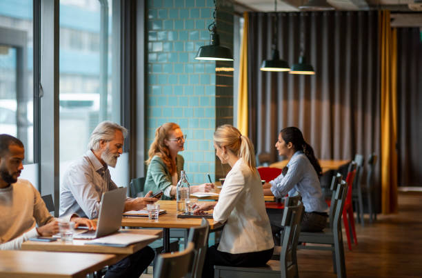 istock Business people having a meeting in a restaurant 1472149707