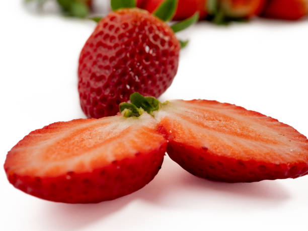 Ripe juicy strawberry isolated on white background.