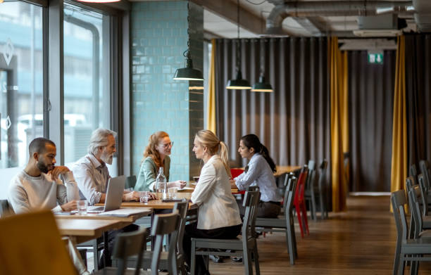 istock Business people having a meeting in a restaurant 1472150908