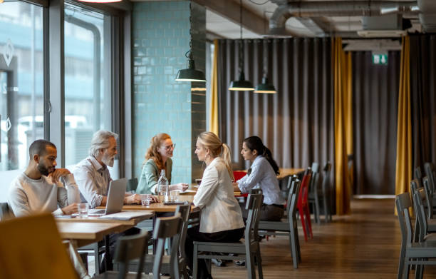 Business people having a meeting in a restaurant stock photo