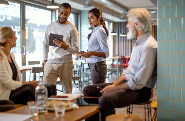 istock Business people having a meeting in a restaurant 1472150930