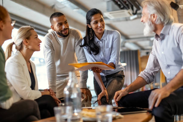 istock Business people having a meeting in a restaurant 1472150944
