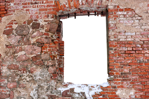 istock Antique red brick wall with an empty window opening. 1472151615