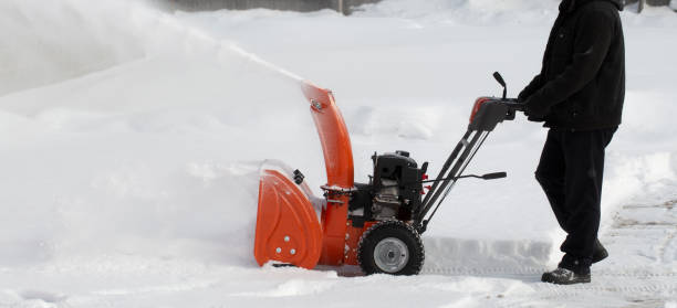 istock A portable snow blower powered by gasoline. 1472156847
