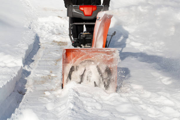 istock A portable snow blower powered by gasoline. 1472157442