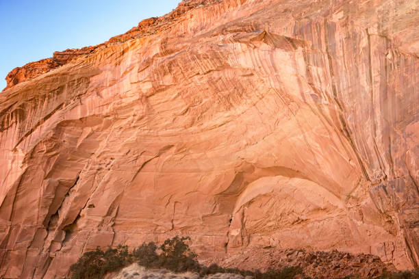 istock Abstract red sandstone wall in the Utah desert wilderness 1472158797