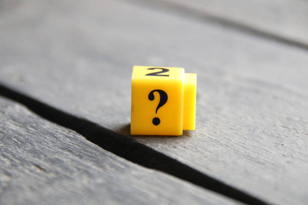 istock Question mark on a wooden background.. 1472159029