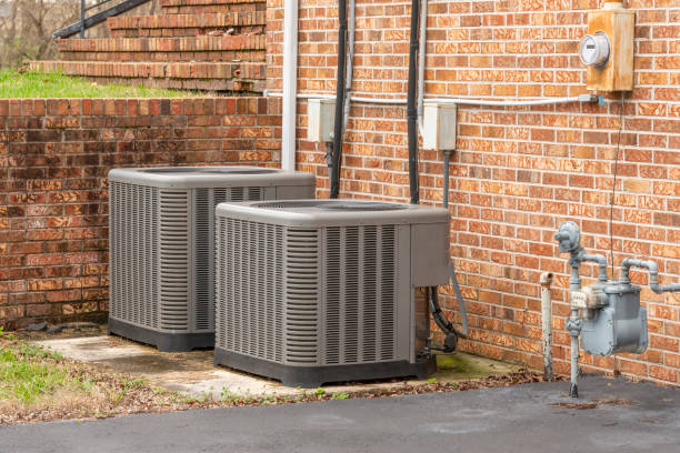 istock Two Commercial Air Conditioners Outside Multi-Office Building 1472163558