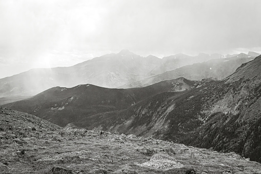 Balck and white art of the high elevation classic Rocky Mountain Landscape with approaching weather storm of snow in the wilderness of Rocky Mountain National Park of Colorado in autumn.