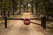 Do Not Enter Gate Across Dirt Road