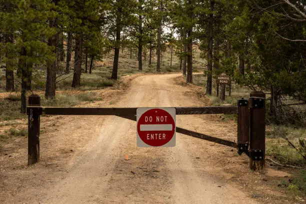 Photo of Do Not Enter Gate Across Dirt Road