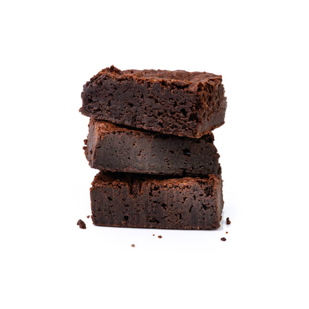 istock Three pieces of brownies stacked isolated over white background 1472170737