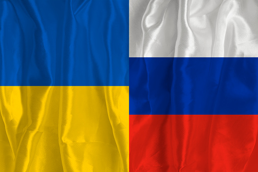 Partial Russian flag is waving on blue gray background. Horizontal composition with copy space. Easy to crop for all your social media and print sizes.
