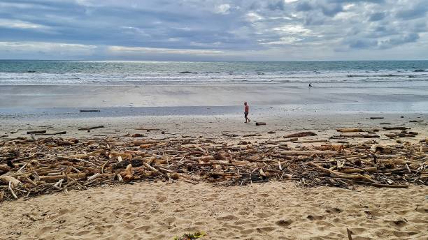istock Kuta Beach covered in trash 1472181188
