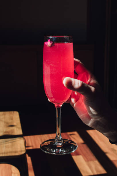 istock hot pink drink in Champagne flute 1472181320