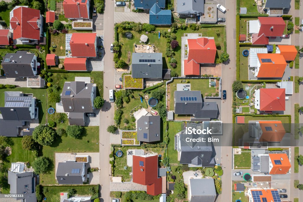 Aerial view of a neighborhood of new homes An aerial top down image shows a neighborhood of new homes. House Stock Photo