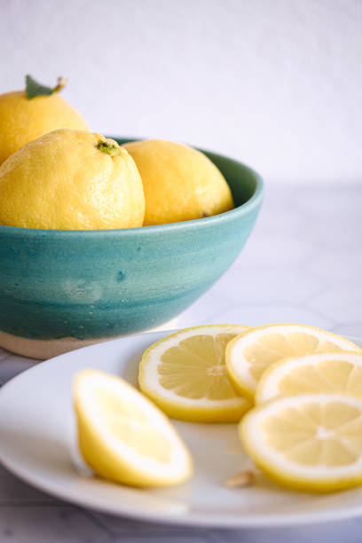 istock Lemons in a Turquoise Bowl 1472185159