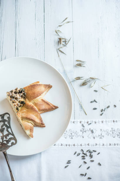istock Handmade Rustic Bread in Sunflower Shape with Seeds on White Table 1472196826