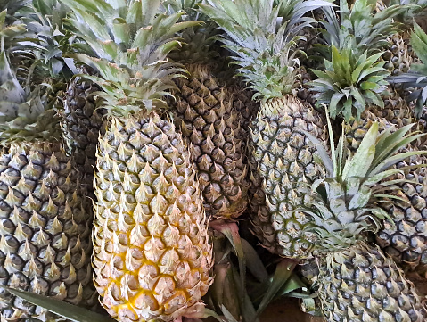 Full Frame Shot Of Pineapples At Market Stall