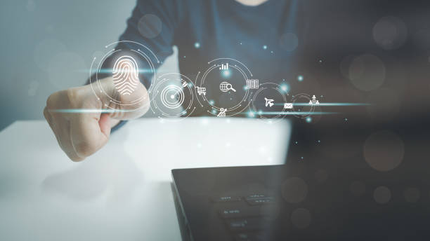 istock Person touching screen to fingerprint scanner, security access information, big data management concept, Internet of things, cloud computing, internet connection, shopping online and cashless society. 1472200616