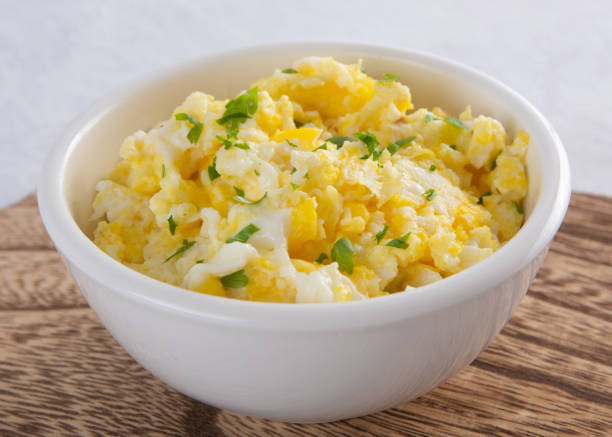 istock Comforting Bowl of Scrambled Eggs with Seasonings 1472204572