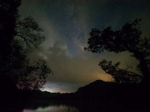istock Milky way over the clouds. 1472213205