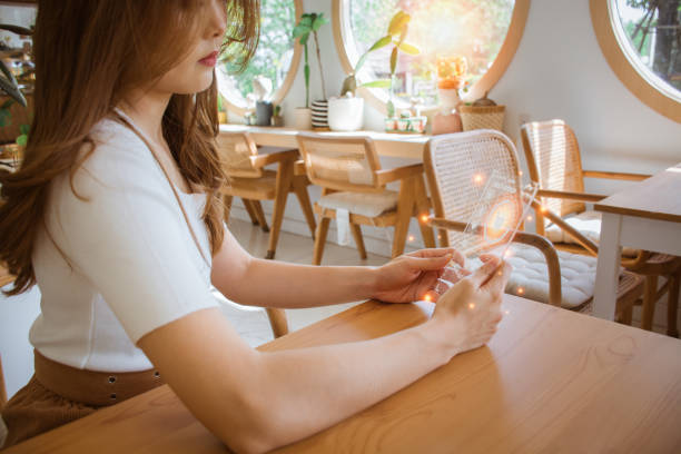 istock Beautiful woman using future smart phone virtual touch screen for order online shopping product. Multimedia Technology. Concept of Digital Future, food delivery, money wallet & online payment. 1472220063